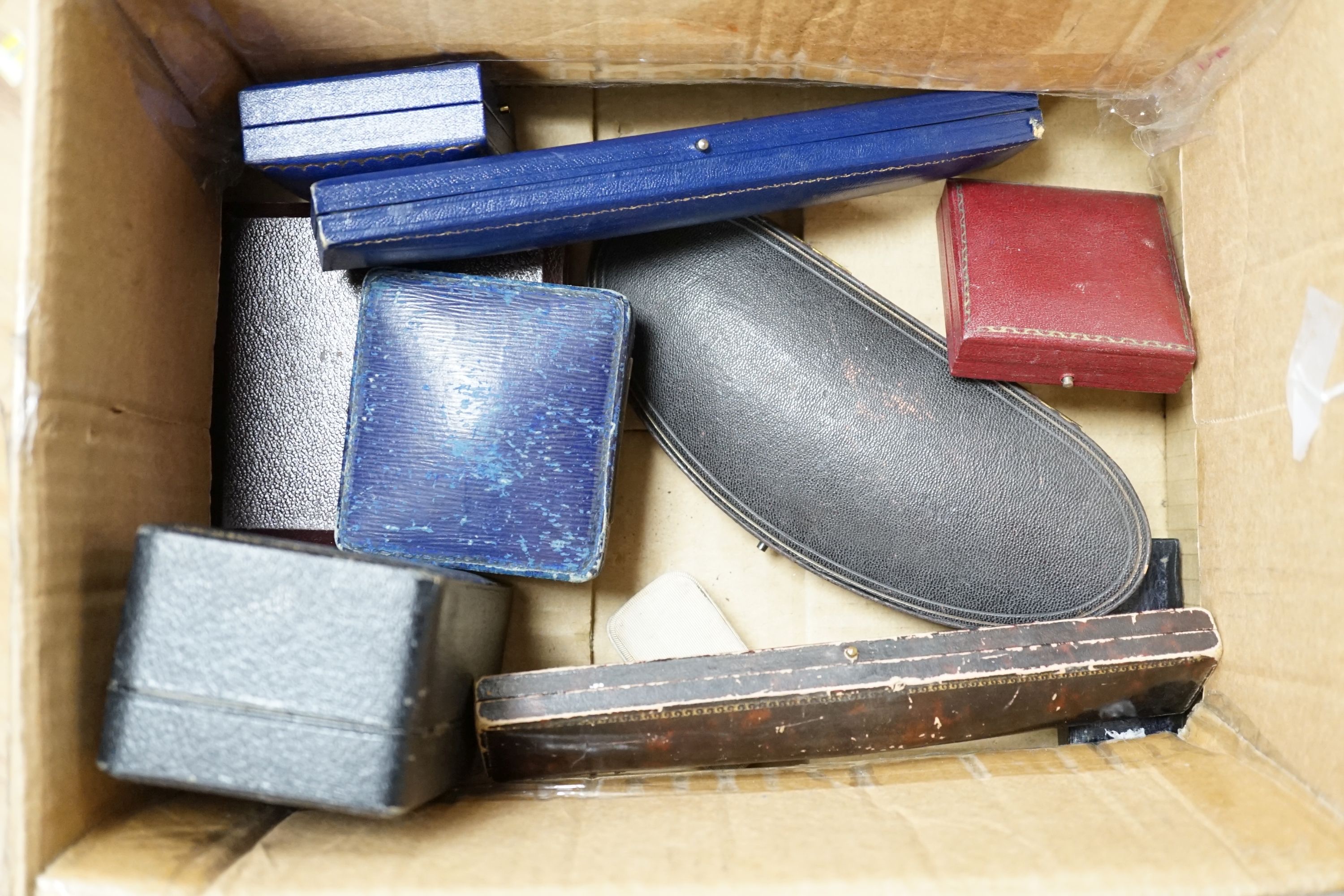 A quantity of mainly early to mid 20th century assorted jewellery boxes, including Antrobus and Wilson & Gill and a later Cartier box.